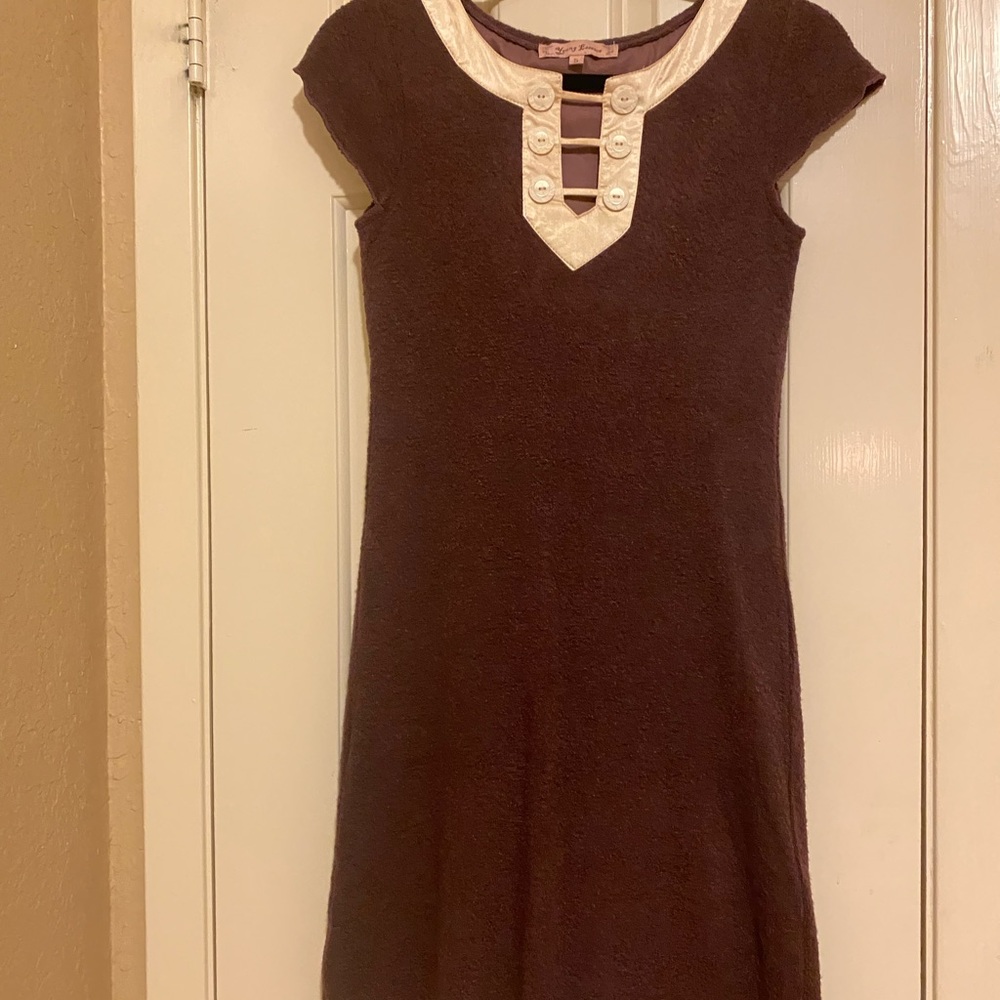 Adorable dress with amazing detail. Size small like new. Young Essence brand